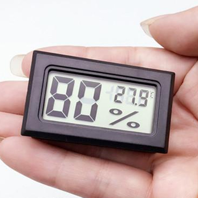 ZHITING Thermomètre hygromètre numérique noir de forme ronde avec affichage  LCD Celsius °C pour humidificateurs, serre : : Cuisine et Maison